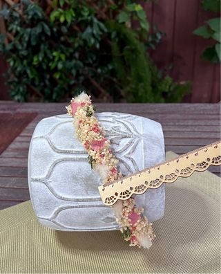 Corona de flores preservadas