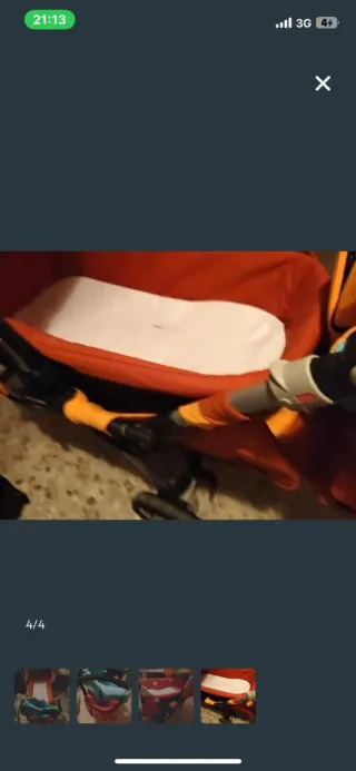 Carro de bebé naranja y azul