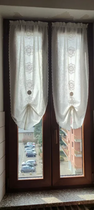 Tende bianche in tessuto