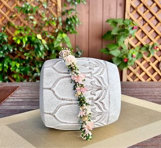 Corona de flores preservadas