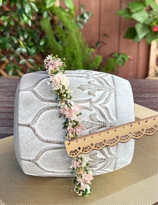 Corona de flores preservadas