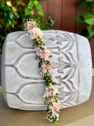 Corona de flores preservadas