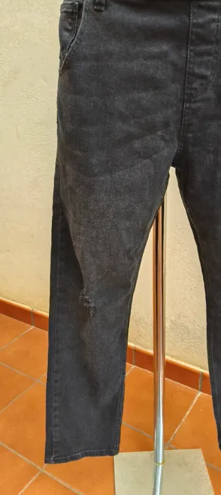 Mono vaquero negro con detalles