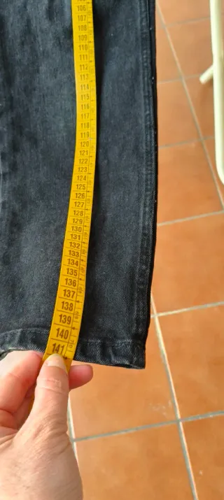 Mono vaquero negro con detalles