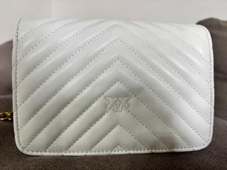 Borsa bianca con tracolla dorata