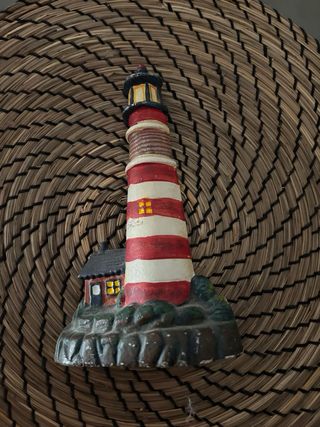 Tope de puerta faro decorativo