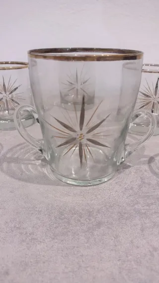 Juego vasos dorados y transparentes