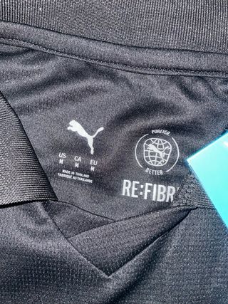 Camiseta Manchester City Talla M Negra y plata.