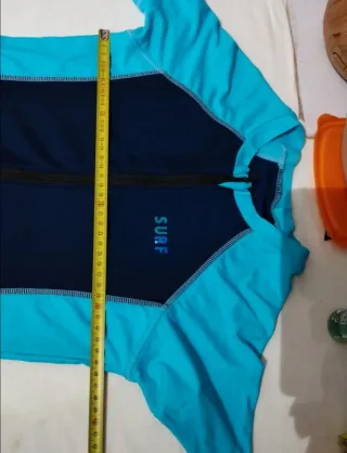 Traje de baño deportivo azul y turquesa