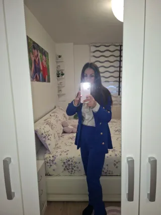 Traje de chaqueta y pantalón azul