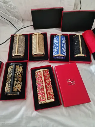 Bolsos de mano Carolina Herrera dorados y rojos