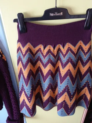 Conjunto punto chaqueta y falda