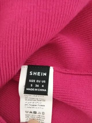 Top rosa de punto con tiras cruzadas