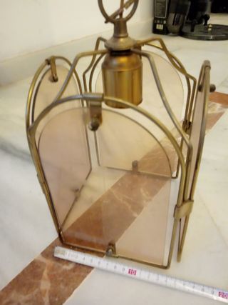 Farol vintage dorado y ahumado