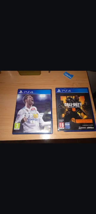 PS4 500GB Sony Negra y 2 juegos.