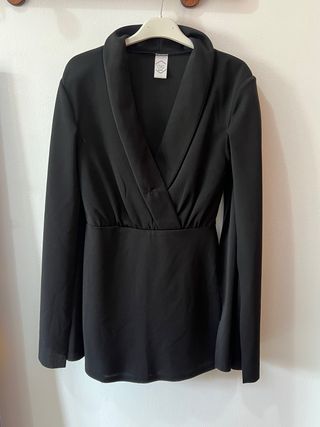 Tuta nera maniche aperte a spacco