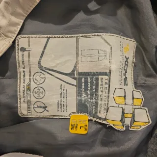 Pantalones impermeables beige