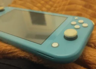 Nintendo SwitchLite+Funda Animal Crossing(Piezas?)