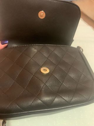 Borsetta Carpisa nera con cuoricini