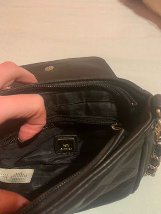 Borsetta Carpisa nera con cuoricini