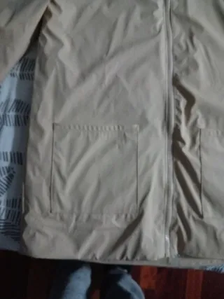 Chubasquero beige con borreguito T.13/14