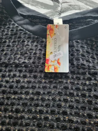 Jersey con mariposa.