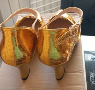 Decolte HI QIANI ANG oro