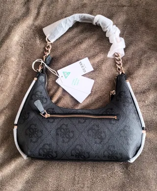 Bolso Guess negro y dorado auténtico