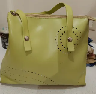 Borsa Coccinelle verde chiaro tutta pelle