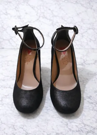 Décolleté nere con cinturino tacco largo