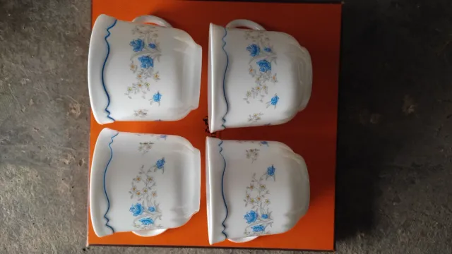 Juego 4 tazas porcelana flores azules