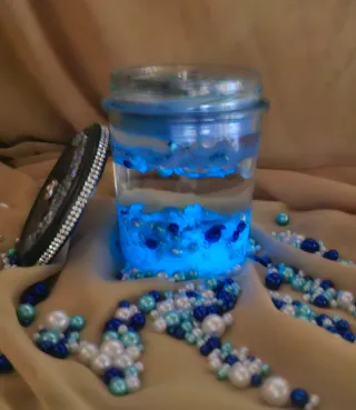 Candela decorativa blu trasparente