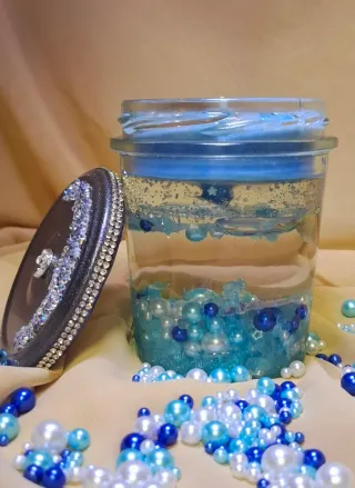 Candela decorativa blu trasparente