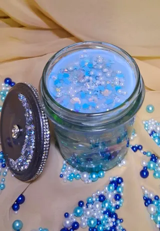 Candela decorativa blu trasparente