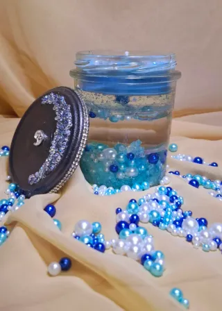 Candela decorativa blu trasparente