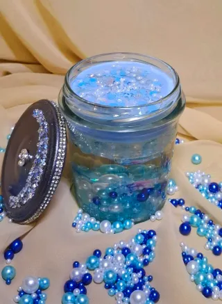 Candela decorativa blu trasparente