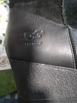 Botas altas negras de cuña