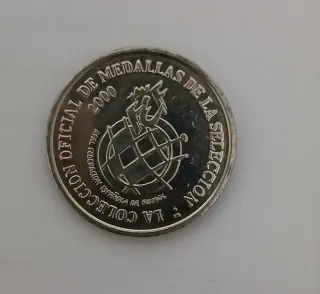 Moneda Conmemorativa Helguera
