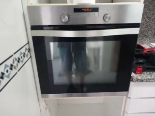 Horno pirolítico, campana inox y vitro