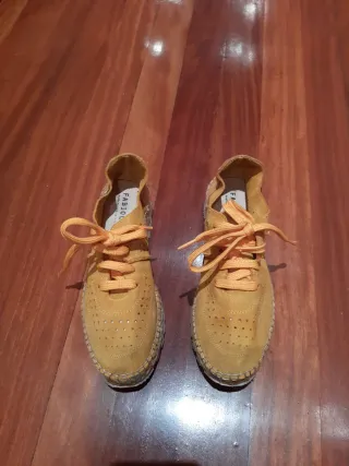 Alpargatas ante perforadas