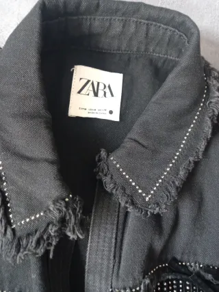 Cazadora Zara mujer negra con flecos