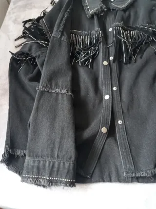 Cazadora Zara mujer negra con flecos