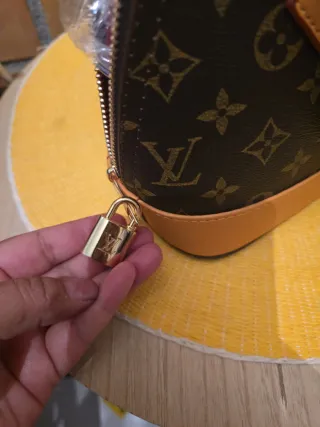 Bolso Louis Vuitton Marrón y Naranja