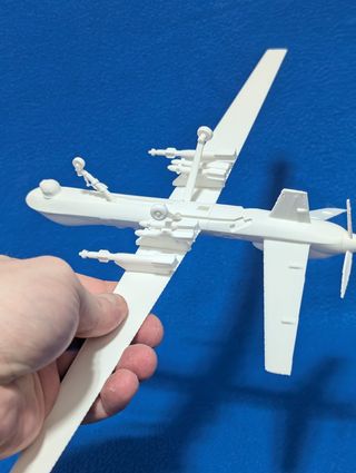 Dron MQ9 Reaper y más vehículos