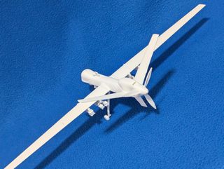 Dron MQ9 Reaper y más vehículos