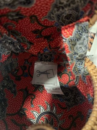 Bolso redondo de mimbre y asa de piel