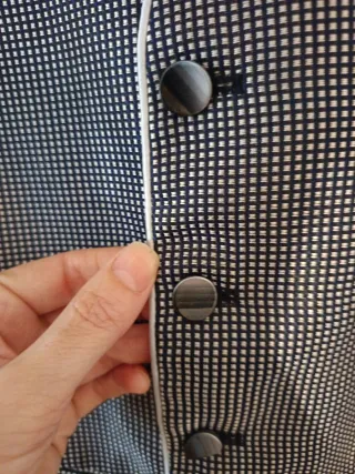 Traje de comunión niño blanco y azul.