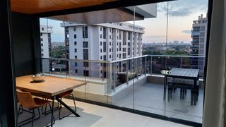 Cerramiento Cortinas de Cristal.