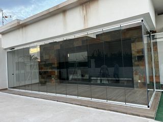 Cerramiento Cortinas de Cristal.
