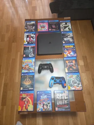 PS4 Slim 1TB + 2Mandos+ Juegos+Cables.